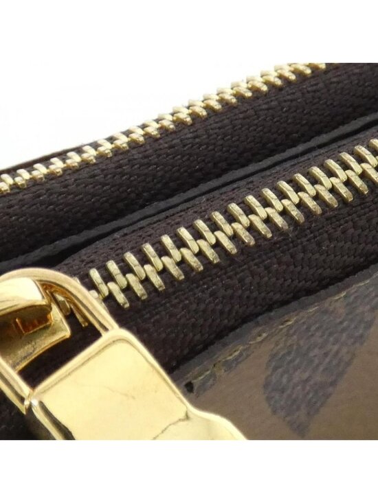 Louis Vuitton Monogram Giant Reverse Canvas Double Zip  Louis Vuitton Monogram Giant Pochette Double Zip Shoulder Bag